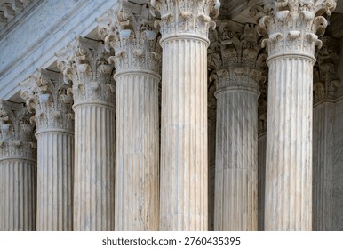 Columns stone architectural perspective layout. Columns marble symmetry repetition. Columns decorative capitals carved detail. Columns facade.