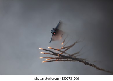  Combat fighter demonstrates anti-missile maneuver with the deployment of false heat targets during air show MAKS in Zhukovsky, Russia