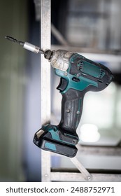 Combination cordless drill for use as a normal drill, impact drill and screwdriver. Maintenance concept.