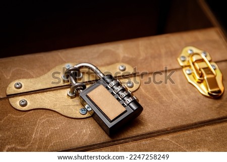 Combination lock on the old chest