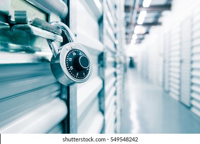 Combination lock on a self storage door. Life style, storage, moving, storing, organizing concept. - Shutterstock ID 549548242
