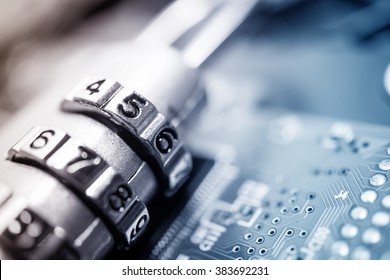 combination padlock on motherboard computer for security concept