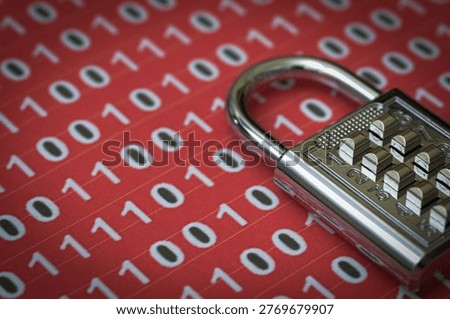 Combination padlock on red binary code background representing cybersecurity and data protection.