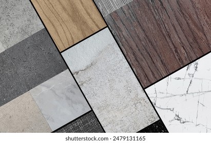 combination of palette interior material samples for mood board consists wooden veneers, stone ceramic tiles, white carrara marble, oak wooden vinyl flooring, fabric laminated in close up view.