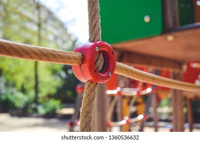 Combination Playground Structure For Small Children. Seesaw, Merry-go-round, Swingset, Slide, Jungle Gym, Chin-up Bars, Spring Rider, Trapez, Playhouse.