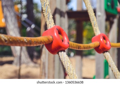 Combination Playground Structure For Small Children. Seesaw, Merry-go-round, Swingset, Slide, Jungle Gym, Chin-up Bars, Spring Rider, Trapez, Playhouse.