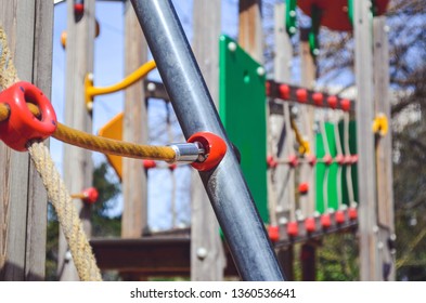 Combination Playground Structure For Small Children. Seesaw, Merry-go-round, Swingset, Slide, Jungle Gym, Chin-up Bars, Spring Rider, Trapez, Playhouse.