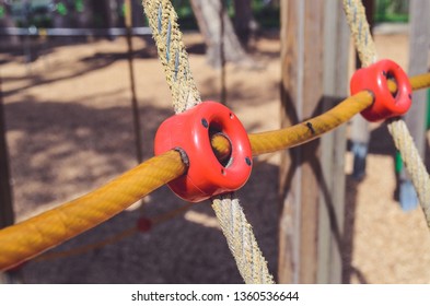 Combination Playground Structure For Small Children. Seesaw, Merry-go-round, Swingset, Slide, Jungle Gym, Chin-up Bars, Spring Rider, Trapez, Playhouse.