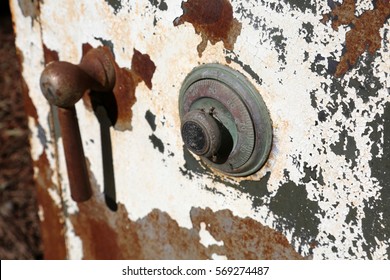 Combination Safe. Old Rusty Paint Peeling Safe With Combination Lock.  