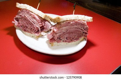 Combination Tongue Corned Beef Sandwich On Seeded Rye Bread At Jewish Deli New York City