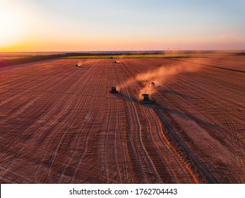 Combine harvester agriculture machine harvesting golden ripe wheat field, aerial view - Shutterstock ID 1762704443