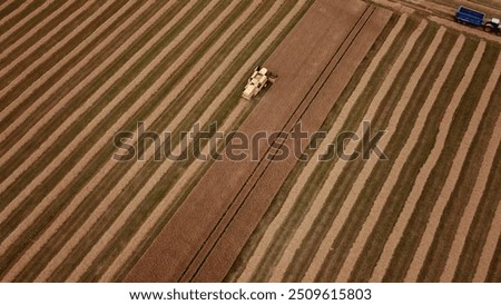 Similar – Image, Stock Photo Combine machine harvesting agriculture wheat field