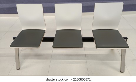 Combined Chairs In The Waiting Room, In A Modern Interior, No People Waiting To See A Doctor