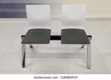 Combined Chairs In The Waiting Room, In A Modern Interior, No People Waiting To See A Doctor