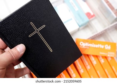 Combined Oral Contraceptive Pill (COCP)  And Bible.  France. 