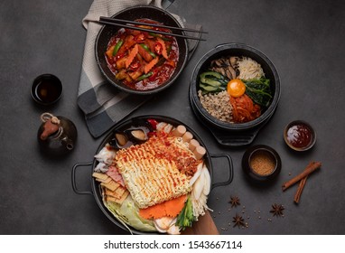 Combo Set of Korean food. Bibimbap (Mixed rice), Jjamppong (Korean noodle soup with gochutgaru (chili powder)), Tteok-bokki (Stir-fried rice cakes)

