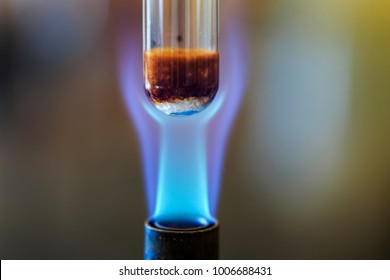 Combustion Reaction Using Sucrose To Produce Caramel And Steam.