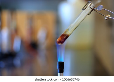 Combustion Reaction Using Sucrose To Produce Caramel And Steam.