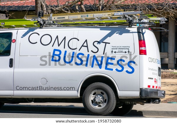 Comcast Business service van parked at service\
location. Comcast Business, a subsidiary of Comcast, provides\
internet, phone, and cable television to businesses. - San Jose,\
California, USA - 2021