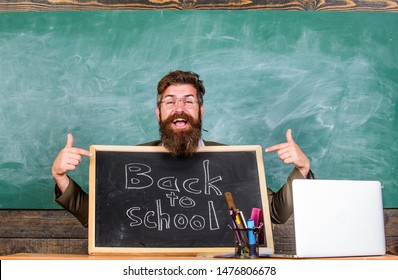 Come To Us. Teacher Welcomes New Pupils Enter Educational Institution. Private School Advertising To Boost Enrollments. Teacher Or School Principal Welcomes With Blackboard Inscription Back To School.