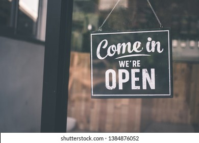 Come in we're open, vintage black retro sign - Shutterstock ID 1384876052