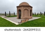 Comerd Qessab Tomb, located in the city of Ganja, Azerbaijan, was built in the 12th century. It is thought that the person buried here lived in the 7th century.