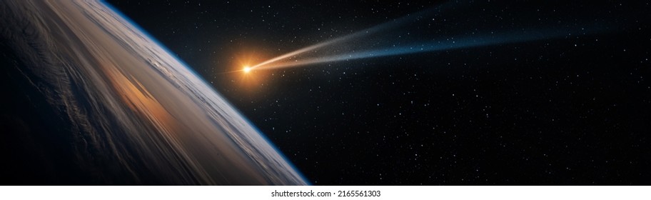Comet, asteroid, meteorite flying to the planet Earth. Glowing asteroid and tail of a falling comet threatening the safety of the Earth. Elements of this image furnished by NASA.  - Shutterstock ID 2165561303