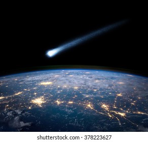 Comet And Earth. Elements Of This Image Furnished By NASA.