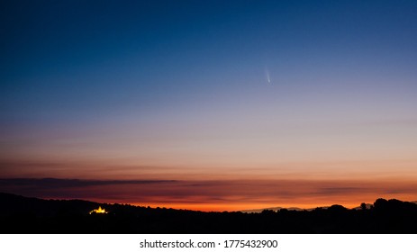 Comet Neowise above a beautiful sunrise in Spain.