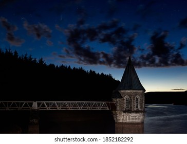 Comet Neowise Above The Pumping House Of A Large Reservoir In The Brecon Beacons