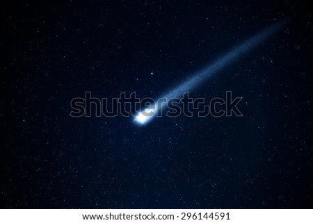 Comet in the starry sky. Elements of this image furnished by NASA.