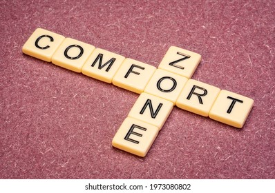 comfort zone crossword in ivory letter tiles against textured handmade paper, a psychological state in which things feel familiar - Shutterstock ID 1973080802