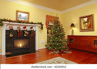 Comfortable Home With Fire Place And Christmas Tree