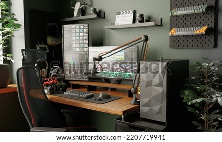 Comfortable home workplace for videographer and video editor. Working table with large monitors.