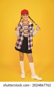 Comfortable Outfit. Modern Outfit. Rebellious Teen. Street Style. Cool Schoolgirl. Have Fun Charismatic Girl On Yellow Background. Tomboy Concept. Teen Age. Girl Adorable Stylish Outfit Teenager