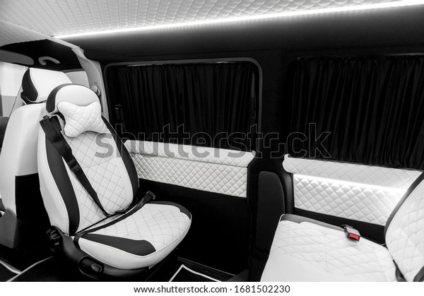 comfortable\
passenger bus interior with upholstered\
seats