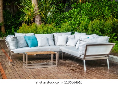 Comfortable pillow on sofa decoration outdoor patio with tropical and nature view
