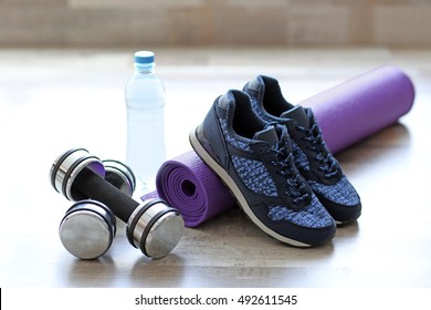 Comfortable Sneakers With Sport Tools On Floor