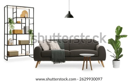Comfortable sofa, side table, shelving unit and pendant light on white background. Interior design
