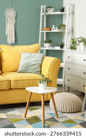 Comfortable sofa, table and shelving unit in interior of living room