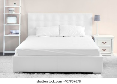 Comfortable White Bed In The Room