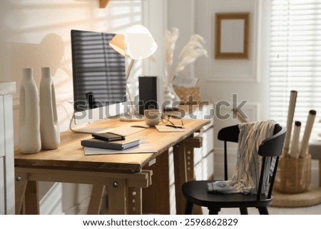 Comfortable workplace with computer in home office