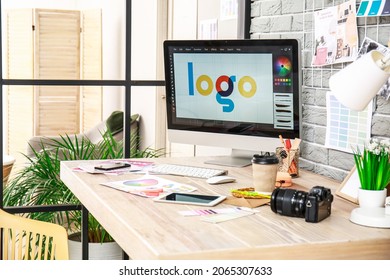 Comfortable Workplace Of Graphic Designer In Office