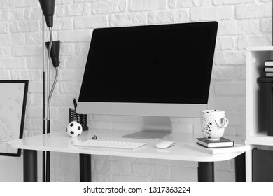 Comfortable workplace with modern computer