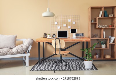 Comfortable workplace with modern computers in office - Shutterstock ID 1918762895