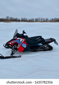 Comfrey, Minnesota, USA, 1/15/2020. Polaris XCR 600 Snowmobile Parked On A Minnesota Lake.