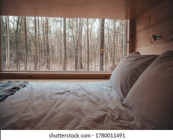 Comfy Bed In Tiny Home Cabin In The Woods