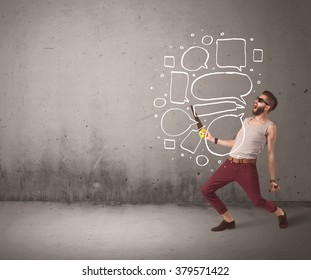 A comic hipster guy shouting in front of grey urban concrete wall with drawn empty text bubbles around his mouth concept - Powered by Shutterstock - Get 15% off with code: PIKWIZARD15