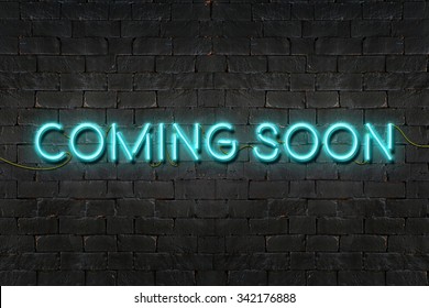 "COMING SOON" neon sign shining on black brick wall,Business concept - Powered by Shutterstock