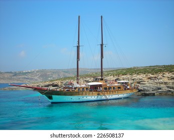 COMINO, MALTA - MAY 30, 2008: Transparent, Cyan Waters Of The Blue Lagoon On The Island Of Comino, Which Is A Popular Location For Filmmakers. It Appears In The Movie Troy And Other Hollywood Movies.